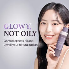 Woman holding a Im From Black Rice Toner Bottle with text about controlling excess oil and revealing natural radiance. 