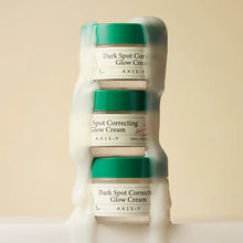 AXIS-Y Dark Spot Correcting Glow Cream 50ml – three stacked jars with dripping cream | Korean Skincare Pakistan