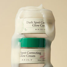 AXIS-Y Dark Spot Correcting Glow Cream 50ml – texture swatch: stacked jars covered in cream | Korean Skincare Pakistan