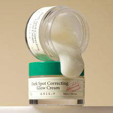 AXIS-Y Dark Spot Correcting Glow Cream 50ml – texture swatch: open jar spilling cream onto jar | Korean Skincare Pakistan