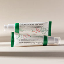 AXIS-Y Dark Spot Correcting Glow Serum 50ml – front of the pack: two pump tubes stacked | Korean Skincare Pakistan
