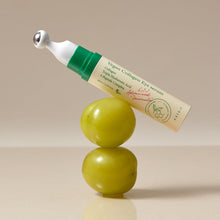 AXIS-Y Vegan Collagen Eye Serum 10ml – front of the pack: roller tube balanced on green fruits | Korean Skincare Pakistan