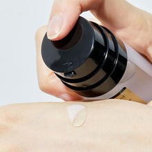 COSRX Advanced Snail Radiance Dual Essence 80ml – texture swatch: pump dispensing drop onto hand | Korean Skincare Pakistan