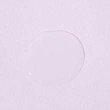 COSRX AHA 7 Whitehead Power Liquid 100ml – texture swatch: clear liquid drop on lilac surface | Korean Skincare Pakistan