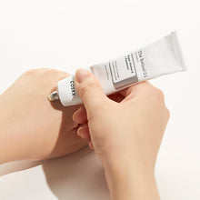 COSRX -Retinol 0.1% Cream 20ml – held in hand to show the size: tube dispensing cream onto hand | Korean Skincare Pakistan