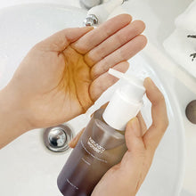 Haruharu Wonder Black Rice Moisture Deep Cleansing Oil 150ml – held in hand to show the size | Korean Skincare Pakistan