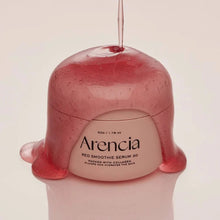 Pink skincare product with 'Arenicia' branding on a beige background